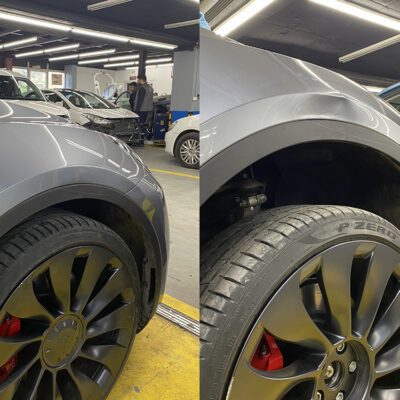 Gri Tesla Model Y çamurluk bölgesindeki göçüğün boyasız göçük düzeltme (PDR) ile onarılması